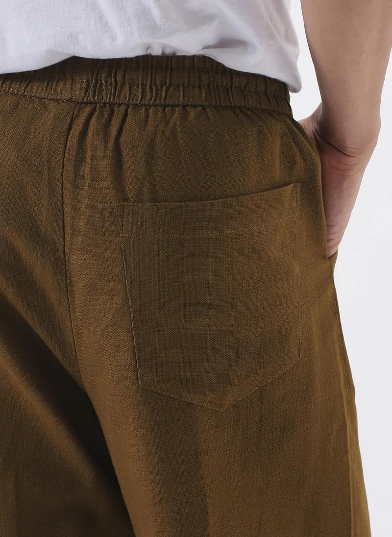 Urbano Fashion  Urbano Fashion Men's Khaki Loose Fit Solid Linen Blend Trousers Non-Stretchable for Men | Best Price UAE